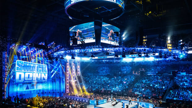 A crowd shot of the WWE SmackDown stage during a live televised show.